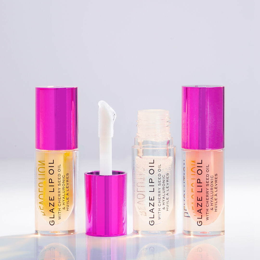 Makeup Revolution Glaze Lip Oil Lust Clear 4pc Set + 1 Full Size Product Worth 25% Value Free