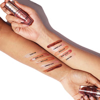 Makeup Revolution Pout Bomb Shimmer Gloss Nude Glow 4pc Set + 1 Full Size Product Worth 25% Value Free