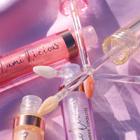 L.A. Girl Lumilicious Luminous Lip Gloss Glow-Up 4pc Set + 1 Full Size Product Worth 25% Value Free