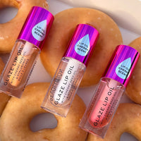 Makeup Revolution Glaze Lip Oil Lust Clear 4pc Set + 1 Full Size Product Worth 25% Value Free